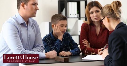 family talking to a lawyer