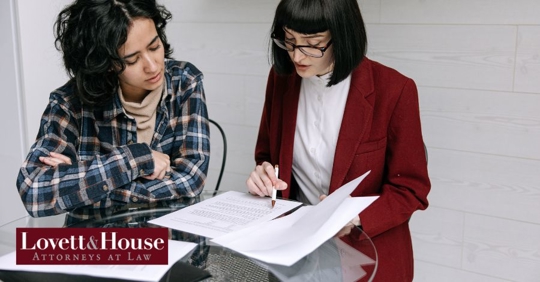 woman talking to estate planning attorney